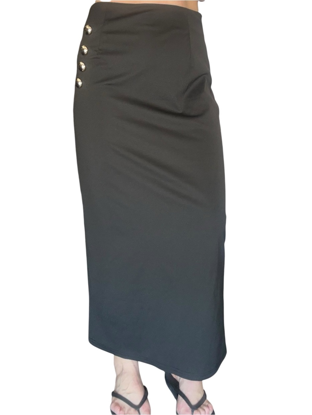 Long fitted black skirt zips in back